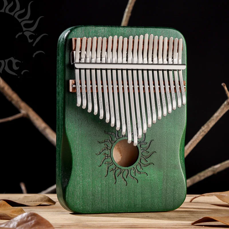 S4c0be718074f4b2e9c15cf85e9d6a2d7I-1.webp 21-key Kalimba in solid maple wood - Sun motif