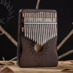 Kalimba 17 blades in maple wood - Dark brown - Sun motif